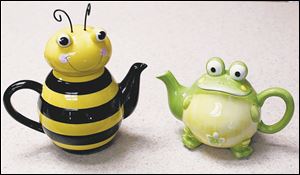 A Bee and a frog teapot at Elaine's Tea Room in Toledo.