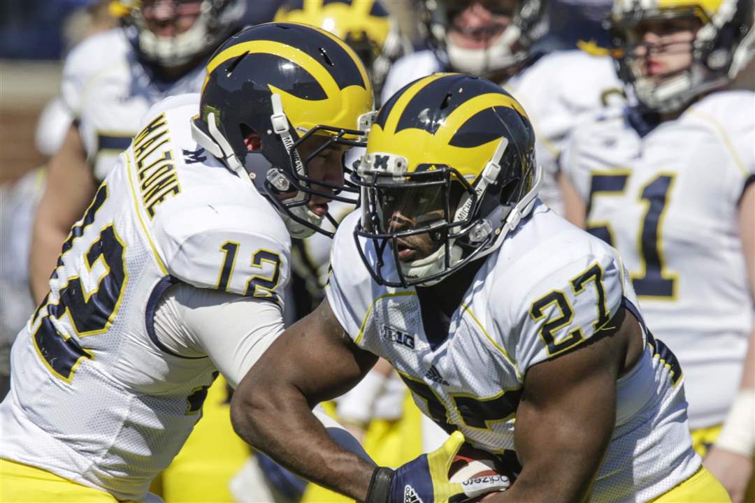 spt-michiganfb-warmups