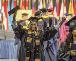 CORRECTION: Pictured is Anthony McGee of Toledo, receiving a Bachelor's Degree in Recreation Therapy. 