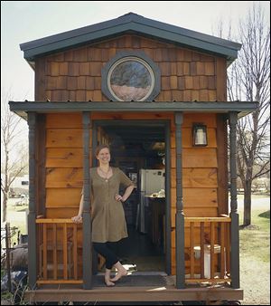 Kim Kasl, 32, blogs about her family’s life in their 267-square-foot house in Minnesota. She and her husband have two children, ages 7 and 5, and no regrets, they say.