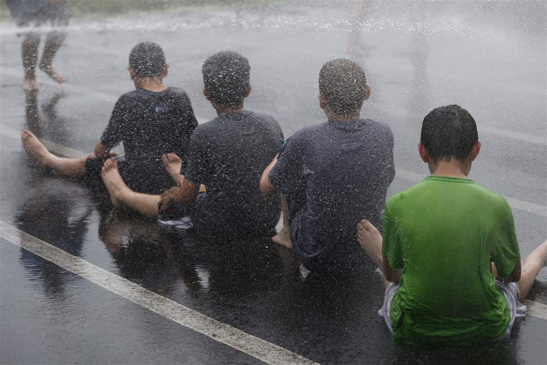 CTY-MUD29p-Maumee-firefighters