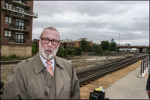 Aurora, Ill., Mayor Tom Weisner fears what would happen if an oil train derails and explodes in an urban area. 