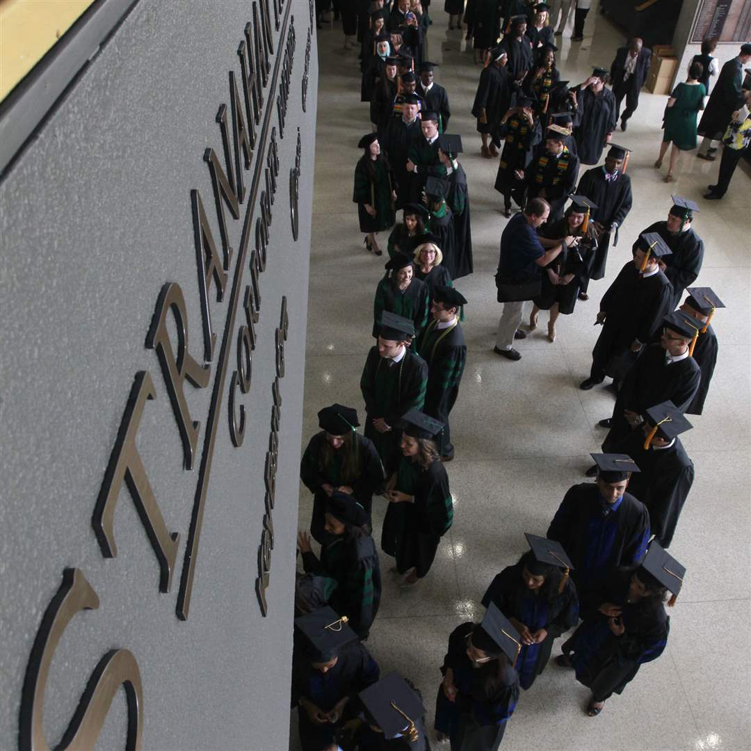 CTY-medicine30pGraduates-file-into-the-theater