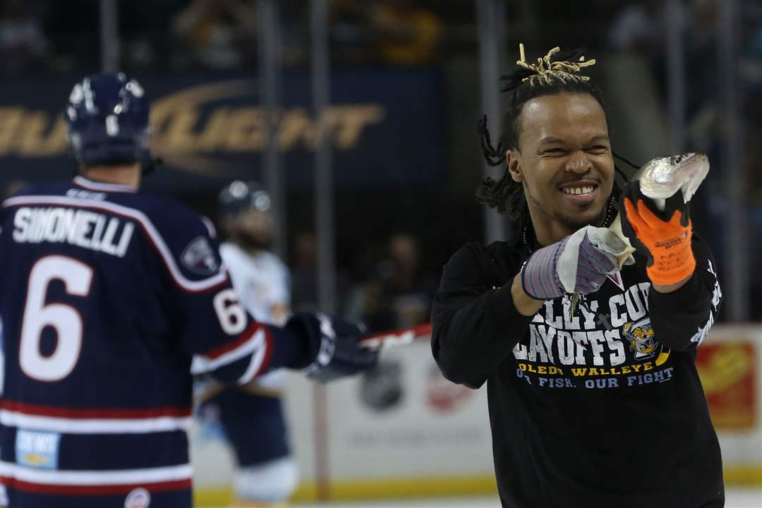 walleye27pIce-Crew-member-Martin-Mundy-holds-ou