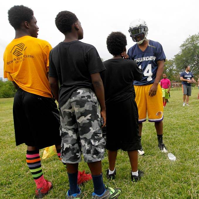 SPT-Minorleaguefootball18p-kids-with-tucker