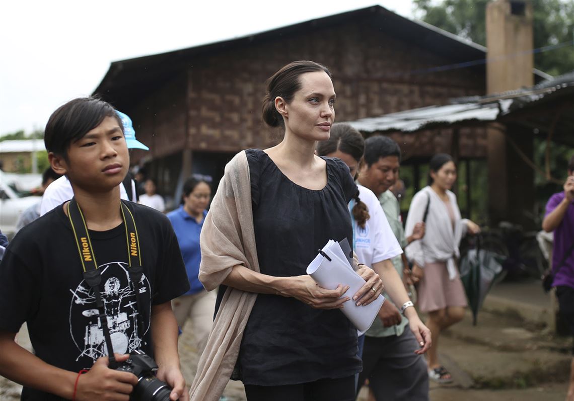 Angelina Jolie, Myanmars opposition leader Aung San Suu Kyi visit female factory workers The Blade