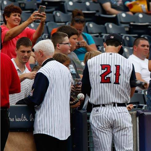 SPT-hens18p-Bishop-Thomas-signs-autographs