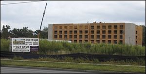 Another Holiday Inn Express is under construction on Secor Road, adjacent to the newer Hampton Inn there.