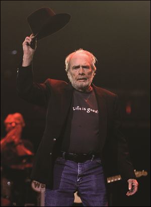 Merle Haggard acknowledges an ovation as he takes the stage during the All for the Hall concert on Tuesday, April 10, 2012, in Nashville, Tenn. The concert is a benefit for the Country Music Hall of Fame and Museum. (AP Photo/Mark Humphrey)