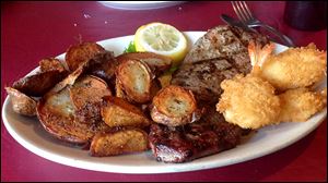 A 10-ounce sirloin with shrimp from Doc's Food & Spirits in Tontogany.