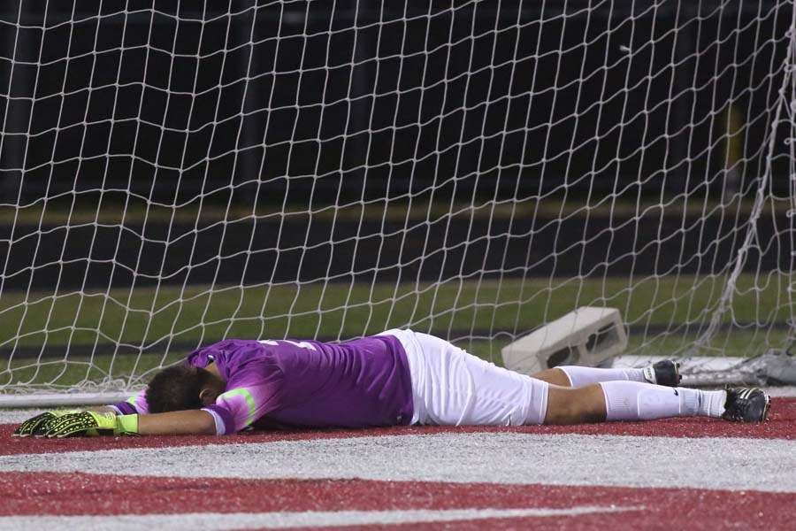 AWSJohnsccr04-aw-goalie-down-vaughn