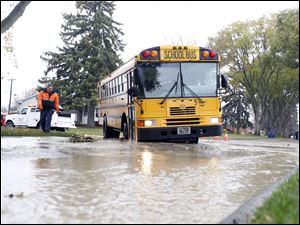 School bus caught in sinkhole