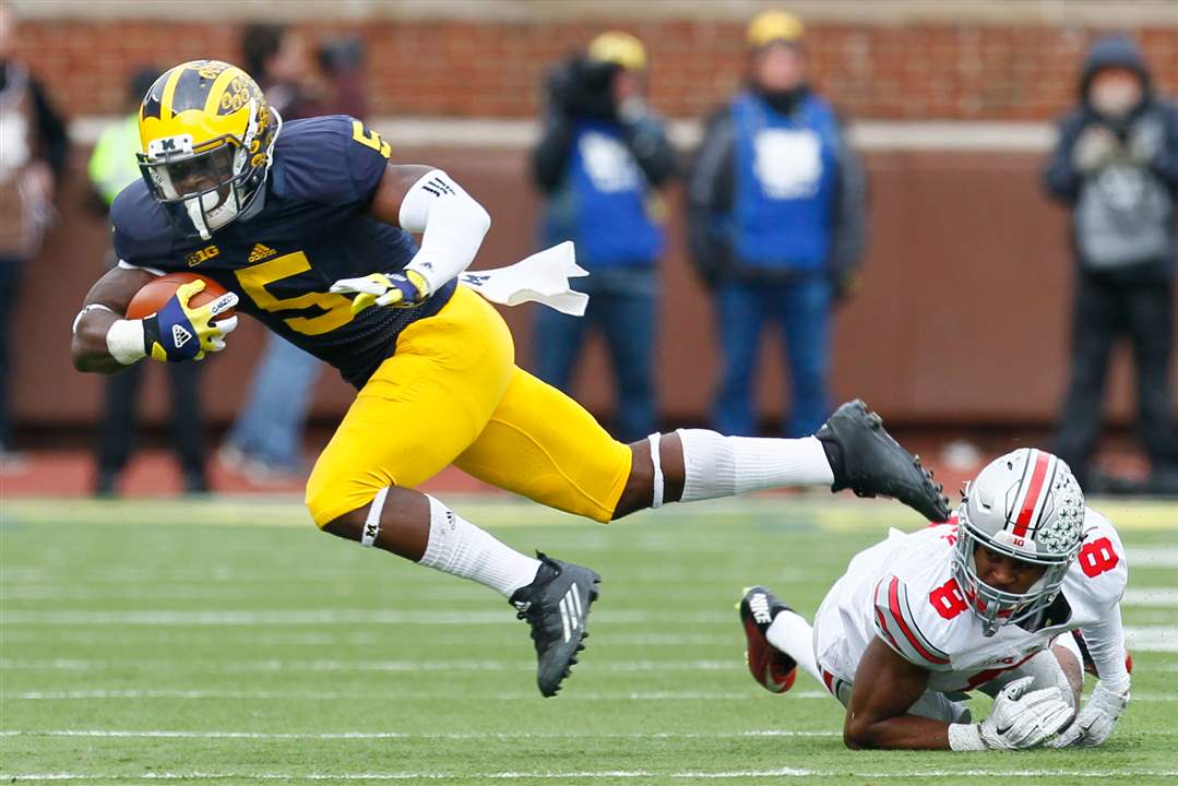 SPT-OhioStateMichigan-Conley-tackle