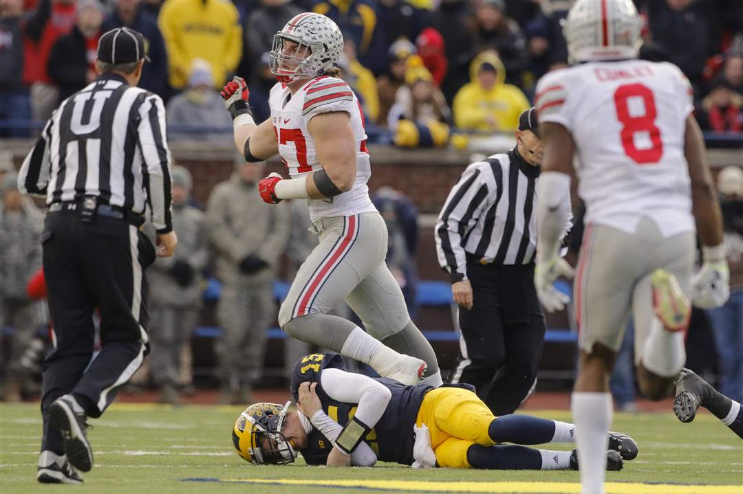 spt-OhioStateUM-Bosa-celebrates-sack