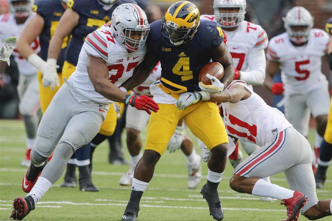 spt-OhioStateUM-tackle