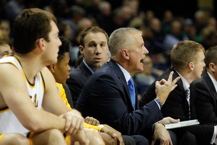 UTmbb3-Kowalczk-on-the-bench