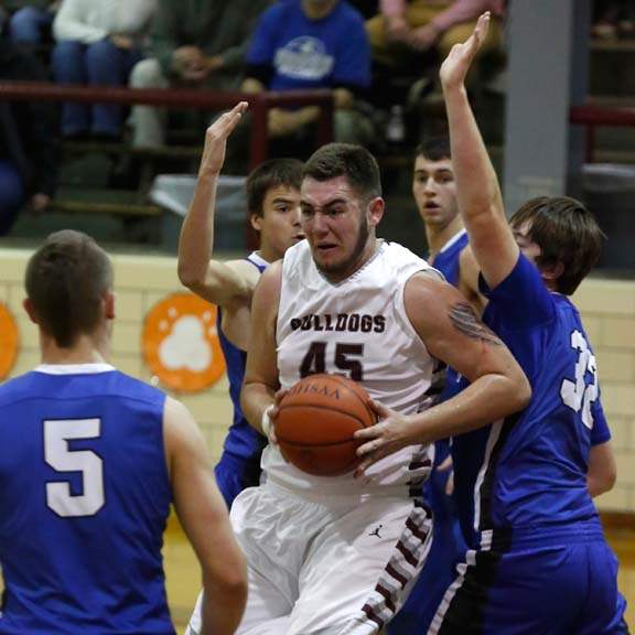 SPT-NBCboysbball16p-Rossford-s-Jeff-Hodak-rebound