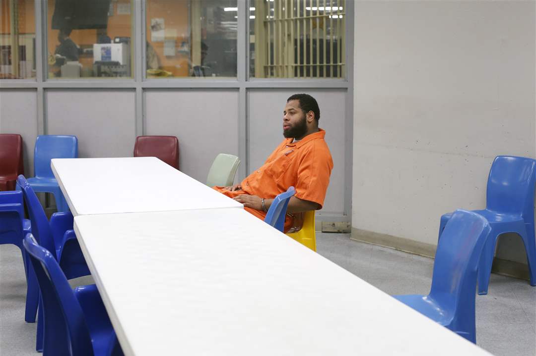 Holcomb-sits-in-9-24