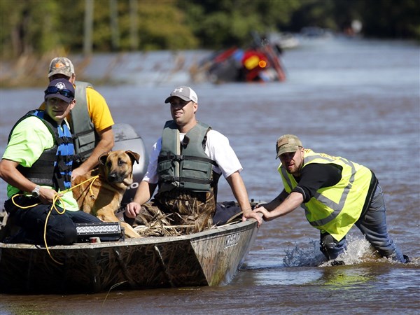 The Latest: Flooding forces North Carolina town's evacuation | The Blade