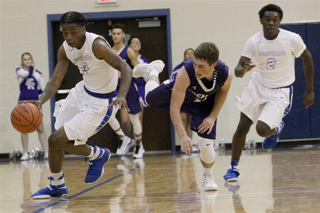 IN PICTURES Woodward 79, Fremont Ross 65 The Blade