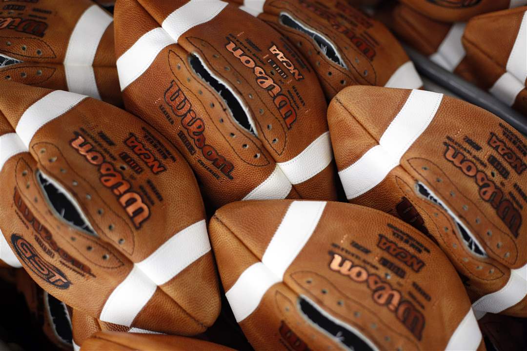 Making footballs in Ada, Ohio The Blade