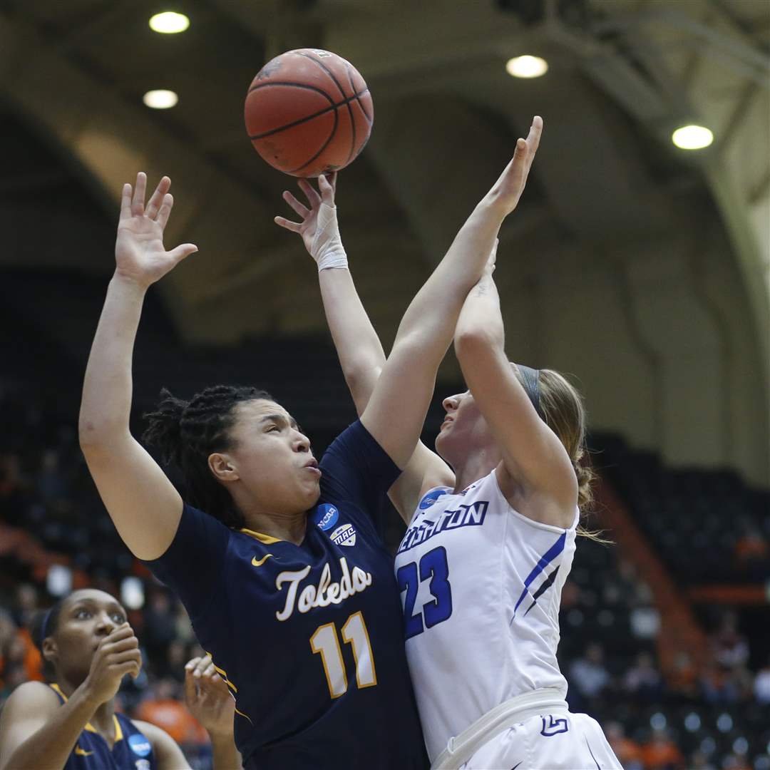 NCAA-Toledo-Creighton-Basketball-Jay-Ann-Bravo-Harriott-fouls-Creighton-s-Marissa-Janning