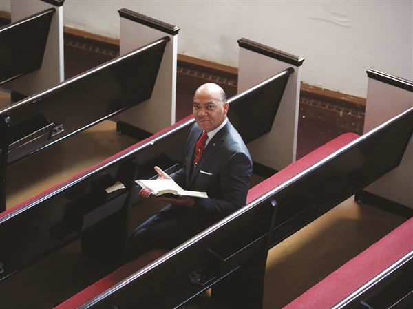 Toledo-area pas­tor has plenty to celebrate