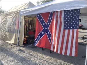A Confederate flag on display at the Wood County fair. One volunteer wants the county fair to ban the sale and display of Confederate symbols by vendors.