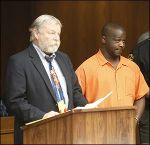 Derrick Bratton is arraigned in Toledo Municipal Court before Judge William M. Connelly, Jr., in Toledo, Ohio on August 21.