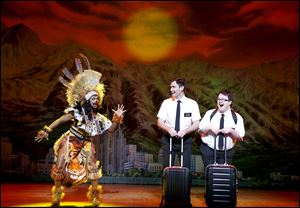 Ryan Bondy stars as Elder Price, center, and Cody Jamison Strand plays Elder Cunningham, right, in ‘The Book of Mormon,’ playing at the Stranahan through Sept. 24.