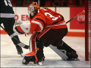 Bowling Green's Eric Dop defends the goal during a college hockey game between Bowling Green State and Michigan State at the Slater Family Ice Arena in Bowling Green, Ohio, on Oct. 13, 2017.