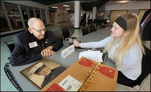 World War II Marine veteran Wayne Matter, 92 is interviewed by Alexa Stevens, 16, at the Penta Career Center Friday, November 10.