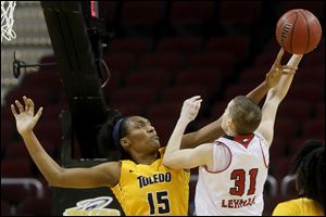 Toledo's Kaayla McIntyre (15), shown in a game against Northern Illinois last season, scored 17 points Friday to help the Rockets open the season with a 74-66 win over St. Francis (Pa.).