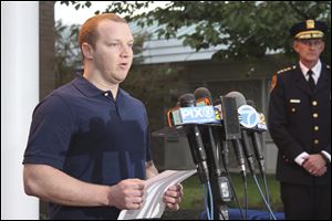 New York City Police Officer Ryan Nash speaks to reporters at the Suffolk County Police Department's Fifth Precinct on Nov. 1, 2017, in Patchogue, N.Y. Nash shot the driver of a rental truck that ran down pedestrians and bicyclists in a suspected terrorism attack in New York City on Tuesday, Oct. 31, 2017. 