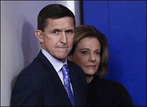 National Security Adviser Michael Flynn stands with K.T. McFarland, deputy national security adviser, before speaking during the daily news briefing at the White House, in Washington, Wednesday, Feb. 1, 2017