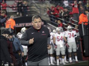 Ohio State defensive coordinator Greg Schiano will remain with the Buckeyes next season.