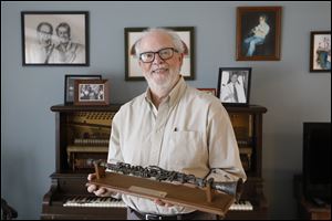 Band leader Ray Heitger keeps memorabilia, including his original clarinet, from the Ray Heiger's Cakewalkin' Jass Band at his home Thursday, November 16, 2017, in Toledo. 