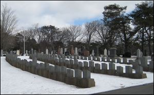 Rows of tombstones at the Fairview Lawn Cemetery in Halifax, Nova Scotia, Canada. One hundred years ago, ships from this old port city on the Atlantic set out to recover the Titanic's dead. They brought back more than 330 bodies; 150 are buried in three Halifax cemeteries. 