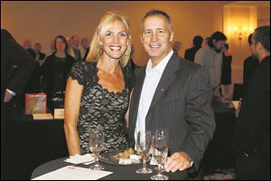 Neva Kyser, left, and Matt Reece attended the Mobile Meals 30th annual Wine Gala Saturday, at Parkway Place in Maumee. The organization is also celebrating its 50th year.  