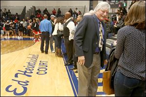 St. John's head coach Ed Heintschel, right, won his 700th game as the Titans' coach on Saturday.