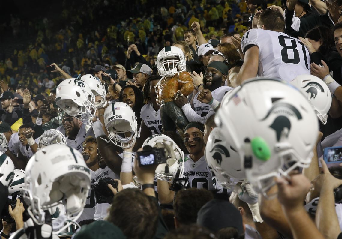 Fans discuss tragedy at MSU and the true meaning of Saturday's