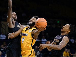 Toledo's Tre'shaun Fletcher, shown in a game against Oakland this season, hit a buzzer-beating 3-pointer to lift the Rockets to an 89-86 win Wednesday in Detroit.