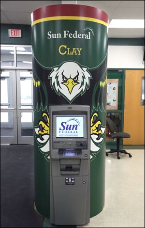 A new ATM machine at Clay High School's new Sun Federal Credit Union.