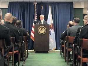 Attorney General Jeff Sessions speaks to the audience about eradicating violent crime in America in the U.S. Attorney’s Office at Four Seagate Center on December 18.