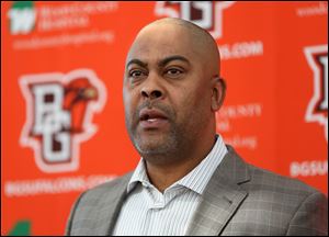 Bowling Green football coach Mike Jinks, shown during the press conference announcing December's signees, hopes to add four future Falcons Wednesday.