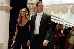 Eric Trump and his wife Lara Trump arrive for a New Year's Eve gala at Mar-a-Lago resort, Sunday, Dec. 31, 2017, in Palm Beach, Fla. 
