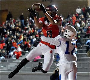 Park Hill's Ronnie Bell catches a touchdown pass during a game last season in Kansas City, Mo. 