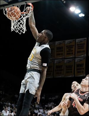 Toledo forward Willie Jackson dunks the ball during Saturday's 101-75 win over Bowling Green State University at Savage Arena in Toledo. The Rockets have won 7 in a row.