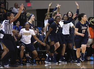 The Toledo bench erupts after Jay-Ann Bravo-Harriott hit one of her 8 3-pointers in the Rockets' win over BGSU Saturday.