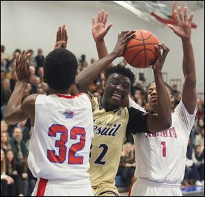 St. John's Jesuit's Vincent Williams, Jr., looks for an opening against St. Francis. Williams is the Division I player of the year in the district.